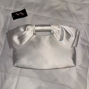 Nina Satin Bow Handle Clutch — Ivory